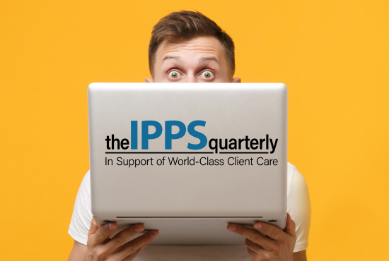 Image of person looking at laptop with IPPS Quarterly logo